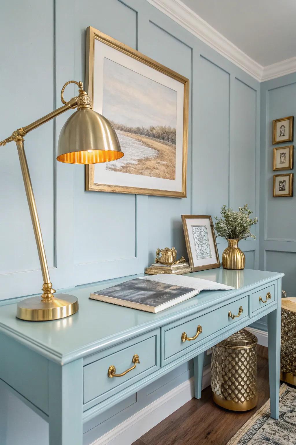 Brass accents bring a warm glow to your light blue office.